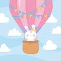 Baby shower, flying cute rabbit on hot air balloon sky, welcome newborn celebration card Royalty Free Stock Photo