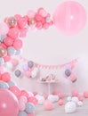 Baby shower party for girl. Different treats in room with balloons