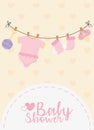 Baby shower, pink hanging bodysuit socks pacifier ratlte celebration card Royalty Free Stock Photo