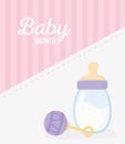 Baby shower, rattle toy and milk bottle stripes pink celebration card