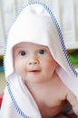 Baby after shower wrapped in towel Royalty Free Stock Photo