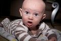 Baby With Silly Expression Drooling Royalty Free Stock Photo