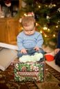 Baby Sitting on Christmas Present Royalty Free Stock Photo