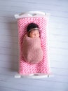 Baby sleep in the bed, little girl, newborn girl photoshoot, cute newborn Royalty Free Stock Photo