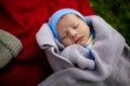 Baby Newborn Sleep , New Born Child Sleeping on grey Blanket, Asleep Infant Kid Royalty Free Stock Photo