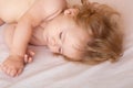 Baby sleeping in the bed. Quiet sleep, sleeping cute child. Adorable sleepy kids. Royalty Free Stock Photo