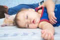 Baby sleeping daytime with brother and cat Royalty Free Stock Photo
