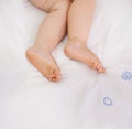 Baby sleeping, feet and top view on bed to relax, comfort and calm at home on mockup space. Toddler, above and closeup