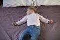 Baby sleeping on king bed Royalty Free Stock Photo