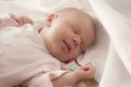 Baby sleeping with a smile Royalty Free Stock Photo