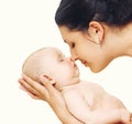 Baby sleeping sweetly on mother's arms