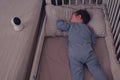 Baby sleeps next to the surveillance camera in the nursery. Home cam Royalty Free Stock Photo
