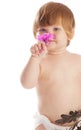 Baby smelling a flower Royalty Free Stock Photo