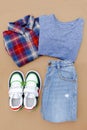 Baby sneakers,t shirt and jeans pants. Set of children`s clothes and accessories for spring, autumn or summer. Fashion kids outfi Royalty Free Stock Photo