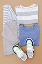 Baby sneakers,t shirt,jumper and jeans pants.Set of children`s clothes and accessories for spring, autumn or summer.Fashion kids Royalty Free Stock Photo