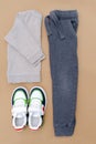 Baby sneakers,t shirt,jumper and jeans pants.Set of children`s clothes and accessories for spring, autumn or summer.Fashion kids Royalty Free Stock Photo