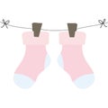 Baby socks clothes hanging in wire