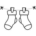 Baby socks clothes hanging in wire