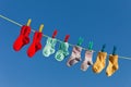 Baby socks on laundry line to dry Royalty Free Stock Photo