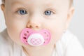 Baby with soother Royalty Free Stock Photo