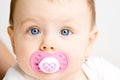 Baby with soother Royalty Free Stock Photo