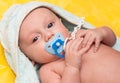 Baby with soother (baby's dummy)