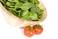 Baby Spinach and Vine Ripen Tomatoes Royalty Free Stock Photo