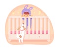 Baby standing in bed and playing with cute puppy Royalty Free Stock Photo