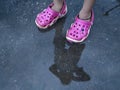 Baby standing shadowed image formed under collected water