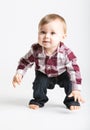 Baby Standing Up in Flannel and Jeans Royalty Free Stock Photo