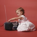 Baby with stereo radio Royalty Free Stock Photo