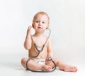 Baby with stethoscope in hands Royalty Free Stock Photo