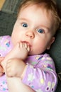 Baby sucking toes Royalty Free Stock Photo