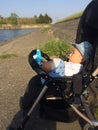 Baby Sunbathing by The Kanagawa River Royalty Free Stock Photo