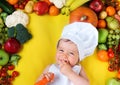 Baby surrounded by fruits and vegetables Royalty Free Stock Photo