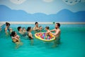 Baby swimming lessons Royalty Free Stock Photo