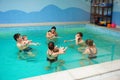 Baby swimming lessons Royalty Free Stock Photo