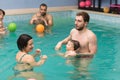 Baby swimming lessons Royalty Free Stock Photo