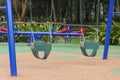 Baby swing set at the playground. Royalty Free Stock Photo