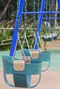 Baby swing set at the playground. Royalty Free Stock Photo