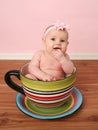 Baby in a tea cup Royalty Free Stock Photo