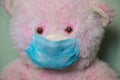 Medical teddy bear masked closeup coronavirus epidemic