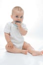 Baby with teether Royalty Free Stock Photo