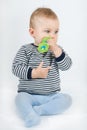 Baby with teether Royalty Free Stock Photo