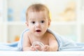 Baby with teether wrapped blanket indoor Royalty Free Stock Photo