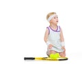 Baby in tennis clothes with racket and balls Royalty Free Stock Photo