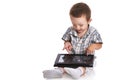 Baby toddler pointing confused at a digital tablet
