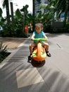 Baby toddler riding a scooter