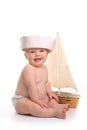 Baby Toddler Sitting up Wearing Sailor Hat Royalty Free Stock Photo