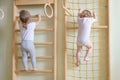 Baby toddlers climbing up the stairs. Royalty Free Stock Photo